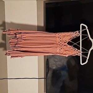 Buckle dress light pink. Almost knee length, I'm 5' 7".